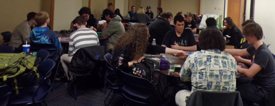 Members of the Magic the Gathering Card Game Club play card and board games during the weekly meeting on Feb. 9, 2023.