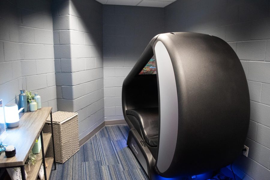 On the lower level of the REC, a small room houses the relax pod alongside a shelf adorned with various relaxing objects. Photo taken Feb. 23, 2023.