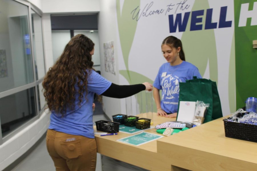 Students participating in games to win prizes during the grand opening of the Well Hub located in the Student Recreation and Wellness Center Feb. 22, 2023.