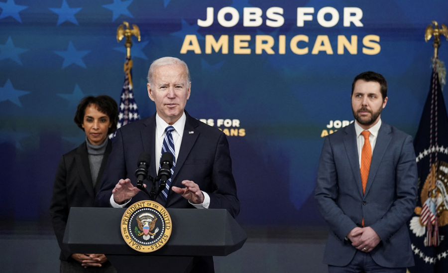U.S. President Joe Biden is flanked by National Economic Council Director Brian Deese and White House Council of Economic Advisers Chair Cecilia Rouse as he speaks about the economy and the January jobs report at the White House today. (Kevin Lamarque/Reuters)