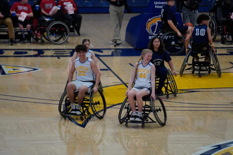 Wooster Wheelchair Generals Austin Wilcox (left) and Madyson Followay (right) celebrate after scoring on Feb. 25, 2023.