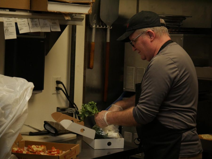 Tom Gavozzi getting ready for dinnertime service at Belleria, located at 135 E Erie St #202, Kent OH 44240.