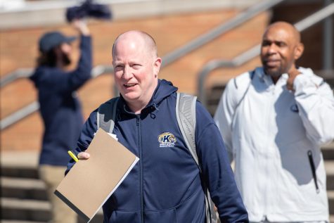 Mens basketball coach Rob Senderoff smiles at the gathered crowd as he heads down to the buses from the MAAC as the team heads to New York for the NCAA tournament March 15, 2023.