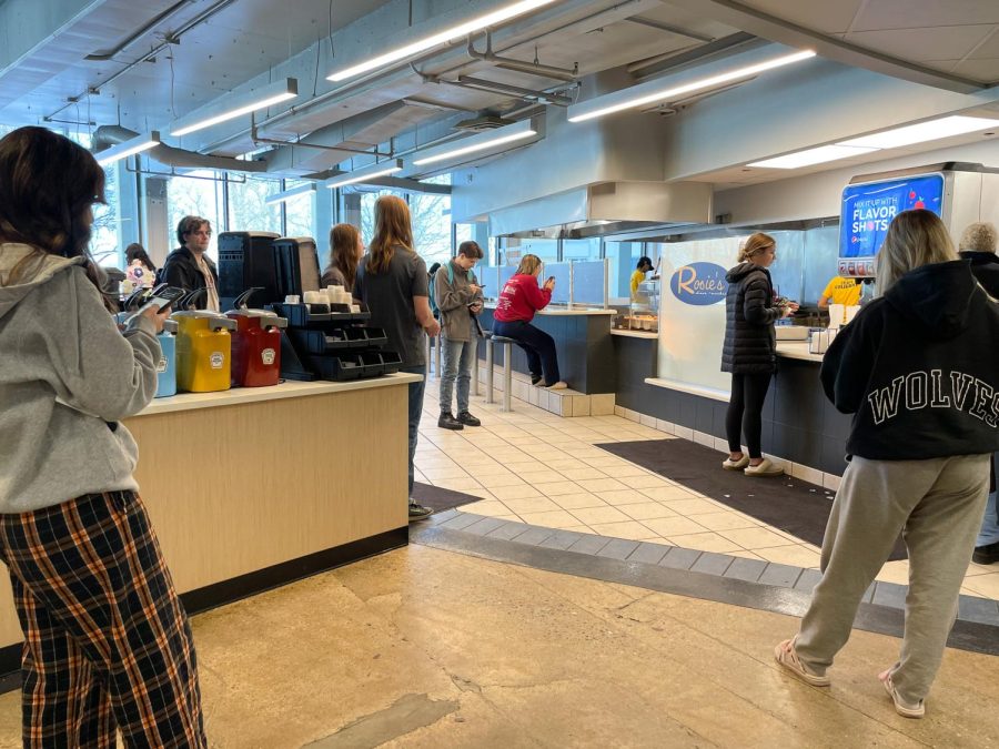Kent State students wait for their orders to be filled at Rosie’s Diner and Market March 15, 2023. Rosie’s Diner is located on the first floor of Tri-Towers.