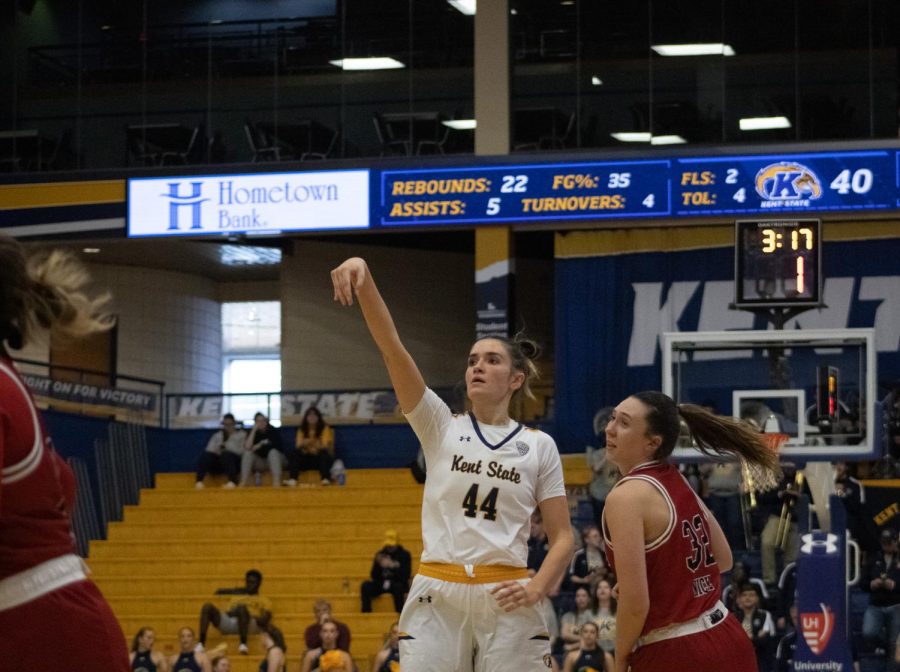 Graduate student forward Lindsey Thall shoots a three pointer in the womens basketball game against Northern Illinois University March 4, 2023.