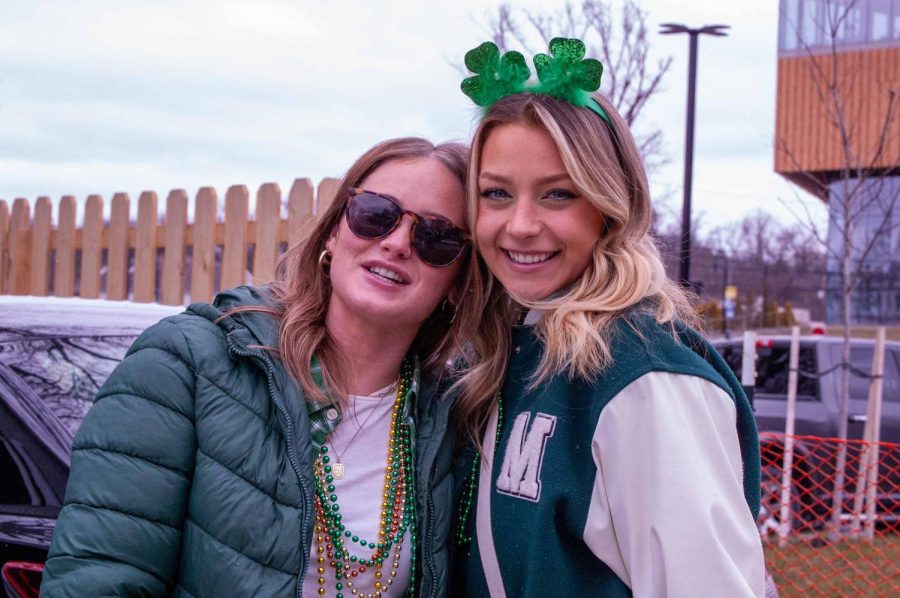 Kent State juniors Anna Holdridge and Madison Kleinendorst posing for a picture during a Fake Paddys get together March 11, 2023. 