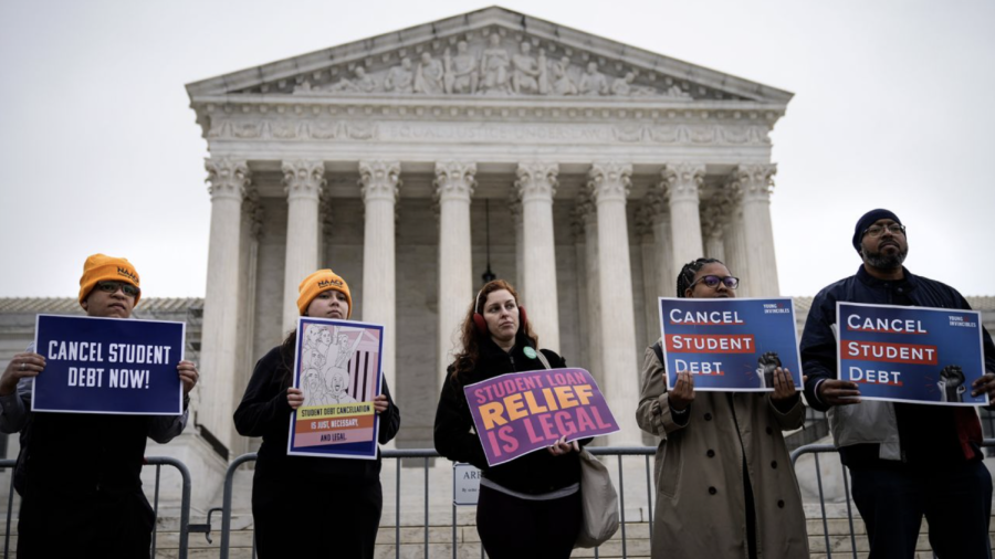 People rally in support of the Biden administrations student debt relief plan in front of the the U.S. Supreme Court on February 28, 2023 in Washington, DC.
(Drew Angerer/Getty Images)