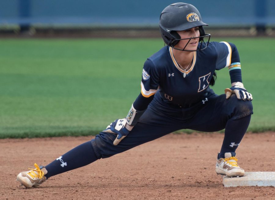 Kent+State+graduate+student+Alexandria+Whitmore+stretches+her+legs+at+first+base+while+she+waits+for+the+pitch+during+the+double+header+against+Toledo+on+April+15%2C+2023.