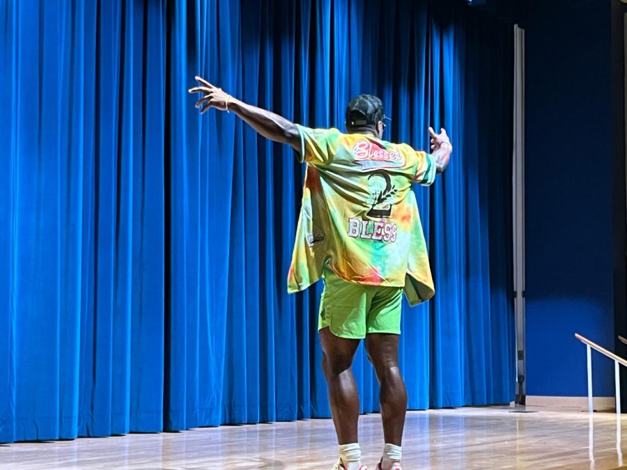 A model during the Winning Way’s Student Athlete Fashion Show shows off his outfit to the crowd. 