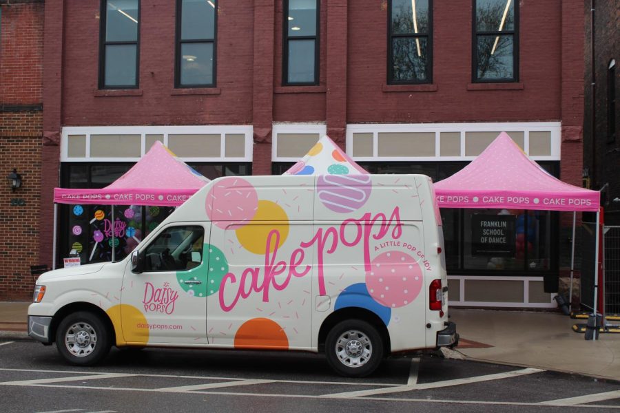 Daisy+Pops+cake+popped-themed+van+parked+in+front+of+the+shop+for+its+grand+opening+April+28%2C+2023.+This+was+day+one+of+a+two+day+grand+opening.