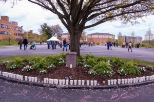 In the Prentice Hall parking lot holds the spots where Allison Krause, Jeffrey Miller, Sandra Scheuer and William Schroeder lost their lives. A vigil has been set in remembrance of them on May 4, 2023.