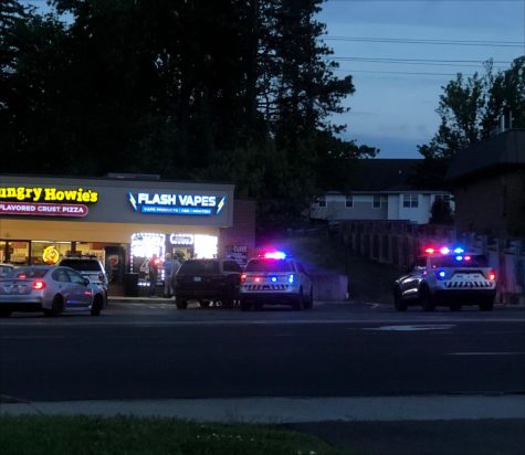 Police respond to armed robbery at Flash Vapes.