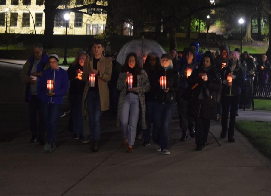 Candle Vigil Attendees make their way through campus May 3, 2023. 