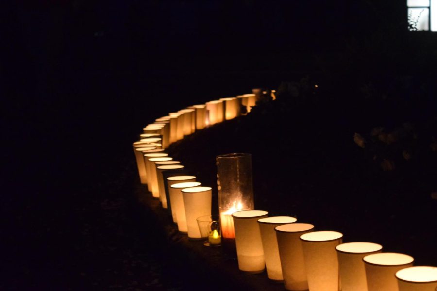 Candles are lined up outside of Taylor Hall May 3, 2023, after the annual Candle Vigil walk.