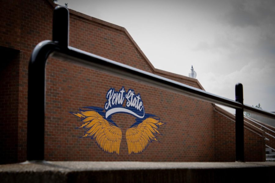 A wall art of wings is located between the Student Center and the M.A.C.C. on Kent State’s campus.