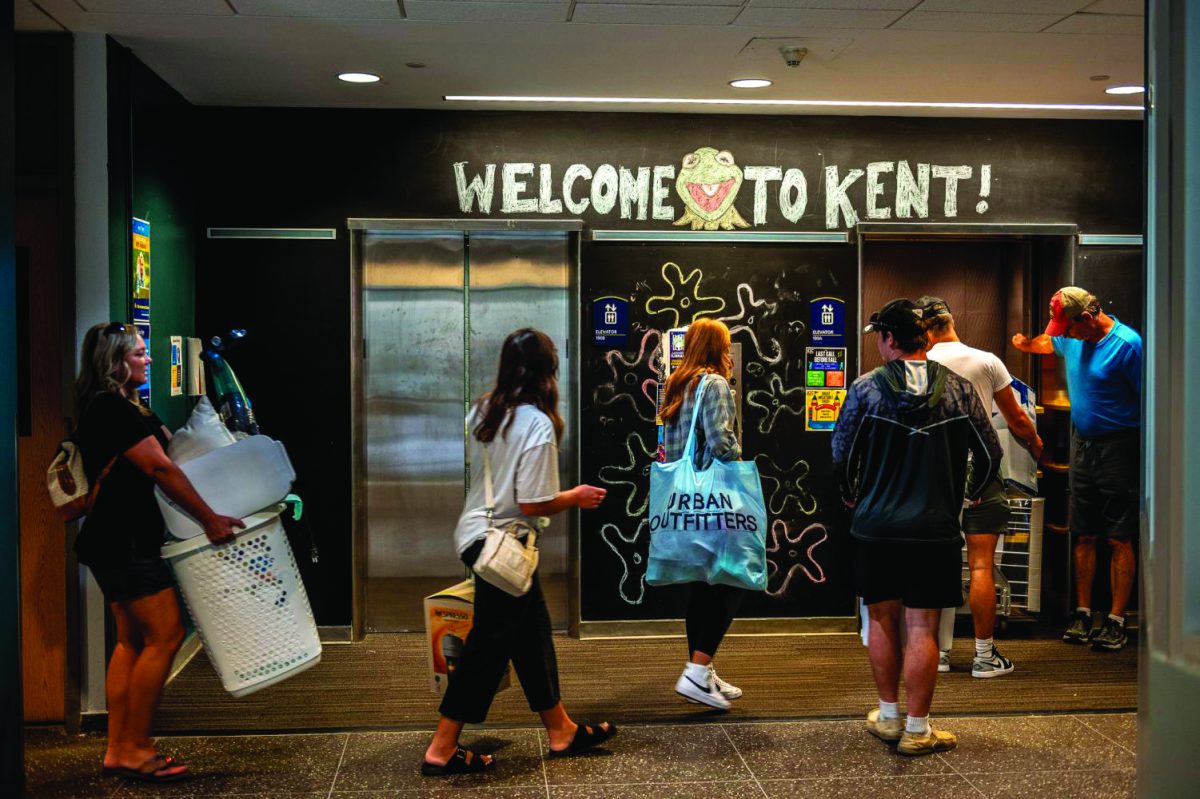 Students, with help from their family and friends, move into Koonce Hall in the Tri-Towers dorm building in the beginning of the fall 2022 semester. 
