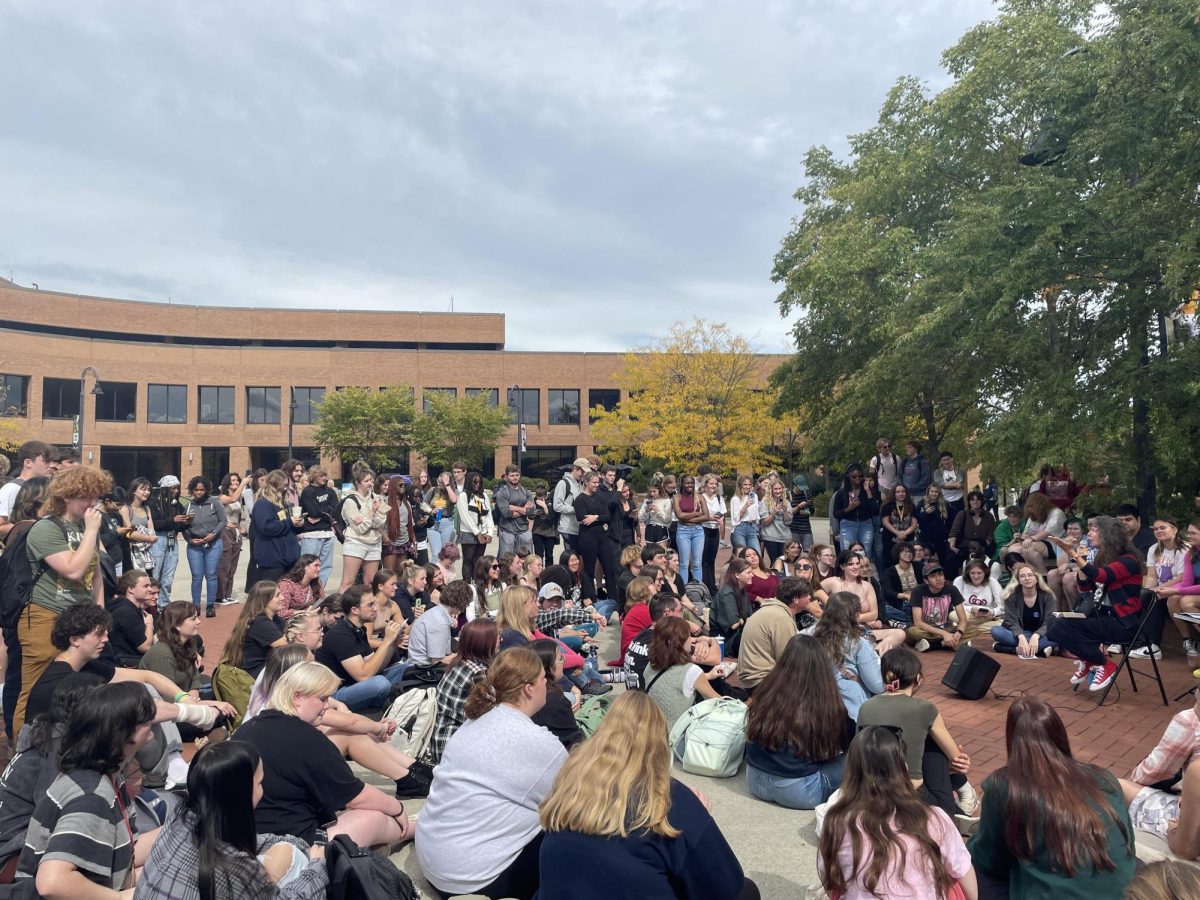 Cindy Smock, the Tiktok campus preacher known as Sister Cindy, preaches to a group of students on Risman Plaza Sept. 25, 2023