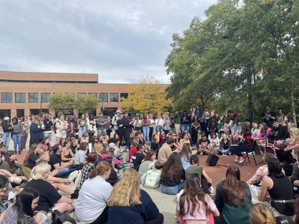 Cindy Smock, the Tiktok campus preacher known as Sister Cindy, preaches to a group of students on Risman Plaza Sept. 25, 2023