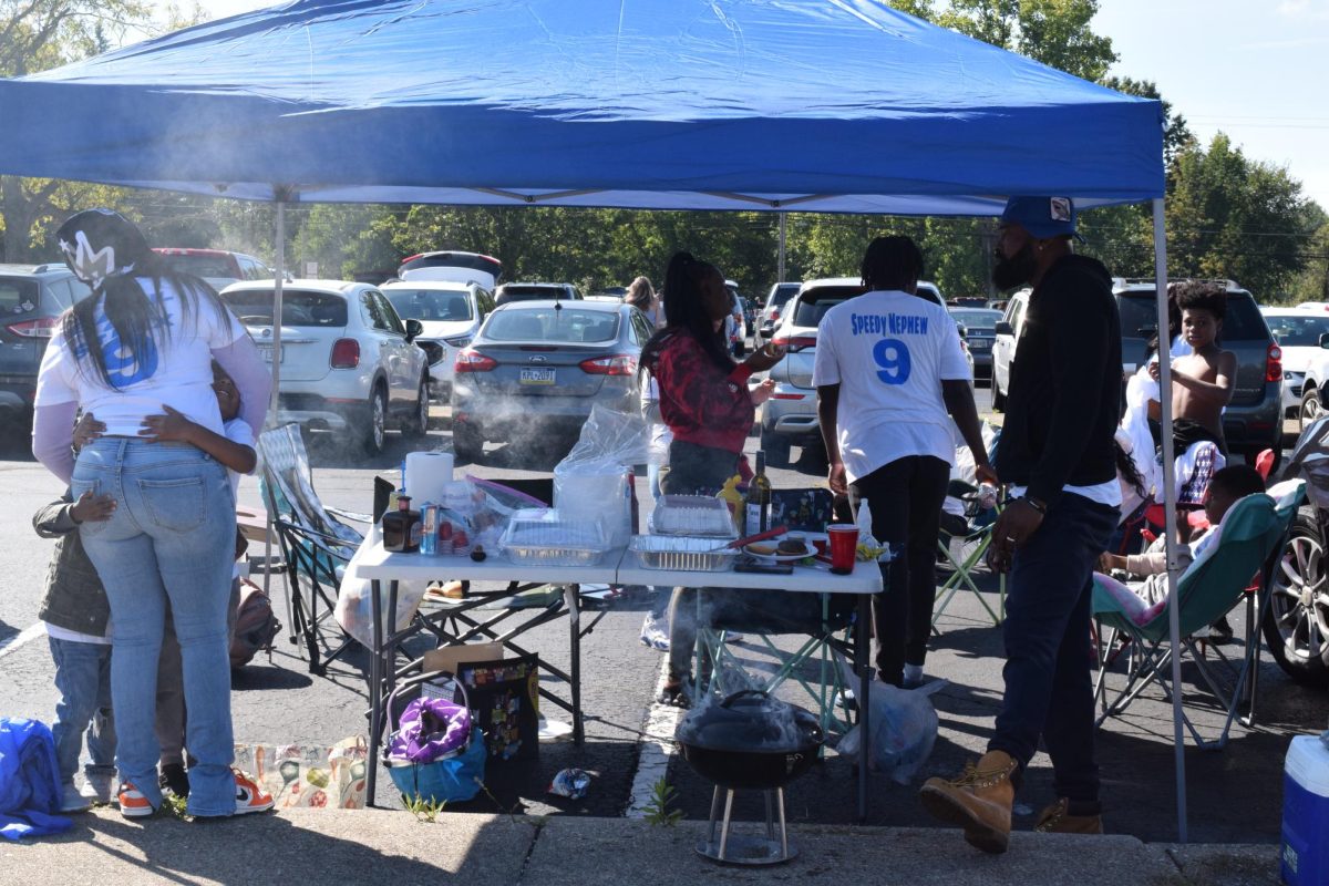 The tailgate for the Kent State vs. Central CT St. football game on Sept. 16, 2023 is filled with Kent State students and fans grilling and playing games.