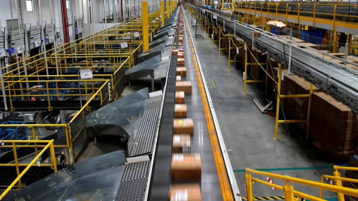 A fast-moving conveyor move packages to delivery trucks during operations on Cyber Monday at Amazons fulfillment center in Robbinsville, New Jersey, U.S., November, 29 2021.