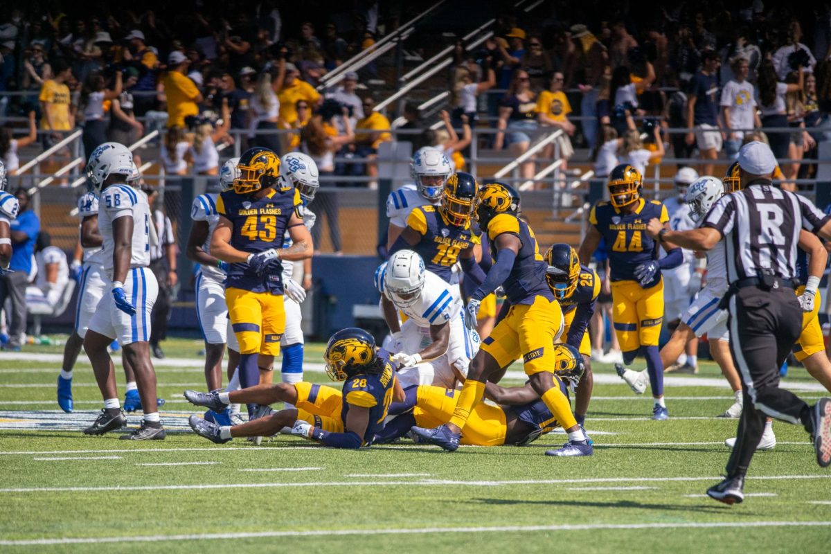 Kent State offensive line trying to get a first down in their home opener against Central Connecticut on Sept. 16, 2023.
