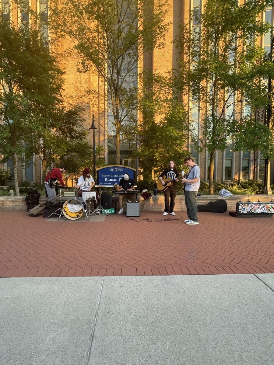Sunset Drive preforming outside of the library