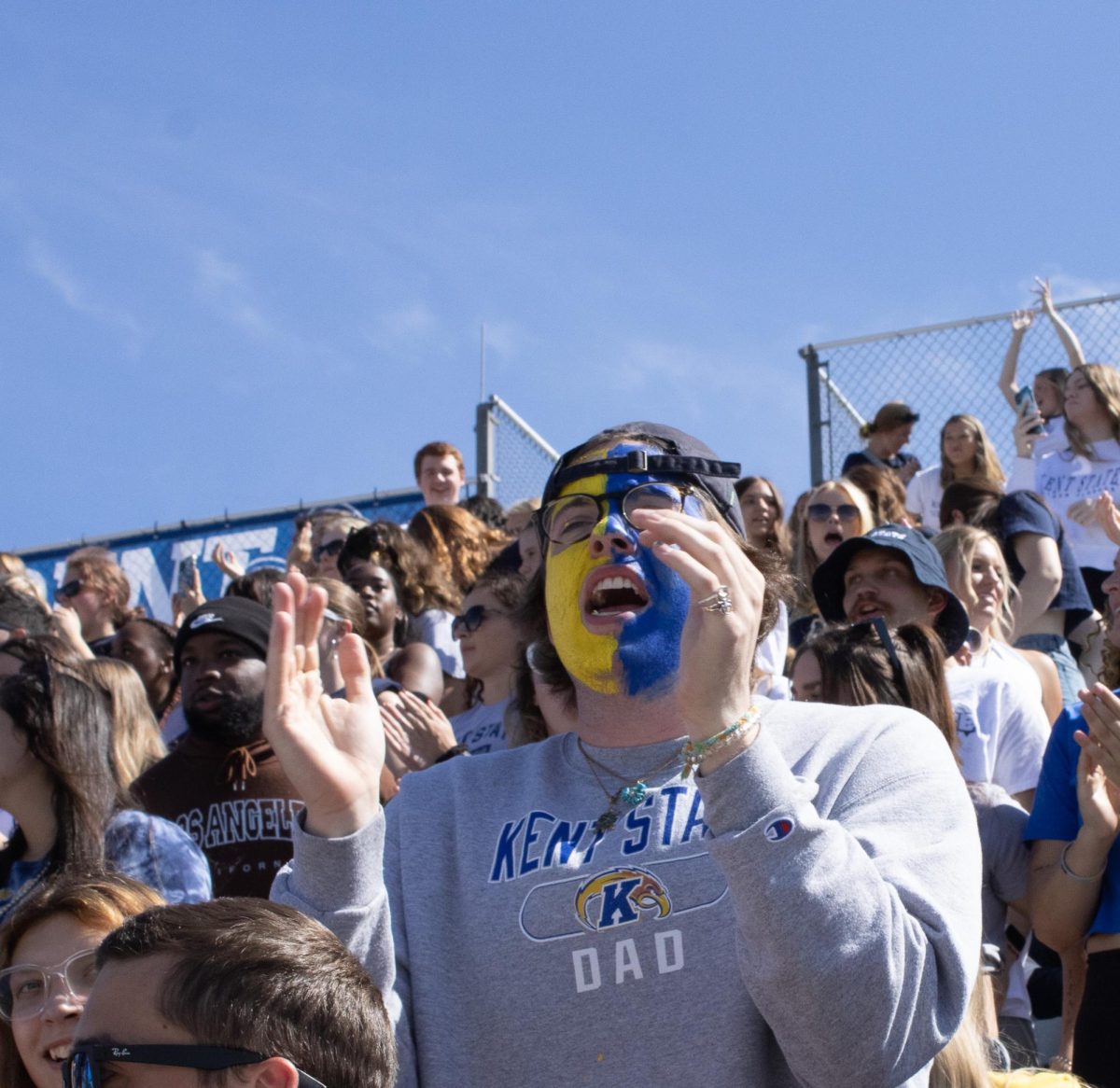 A Kent State student cheers at the kickoff of the Golden Flashes football team against Central Connecticut State on Sept. 16, 2023.