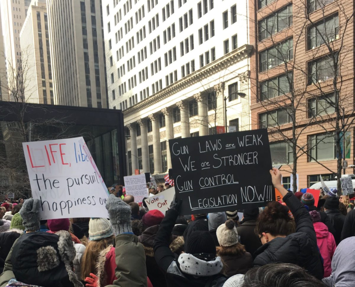 People attend a gun control protest in Chicago in 2018. 