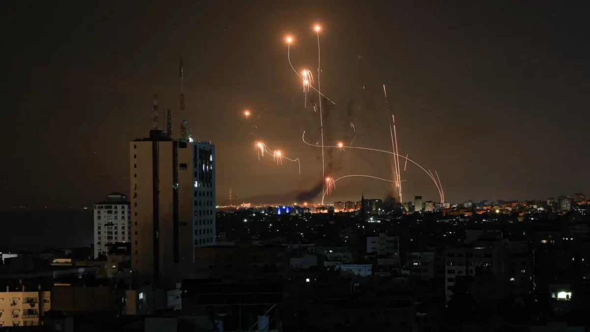 An+Israeli+missile+launched+from+the+Iron+Dome+defence+missile+system+attempts+to+intercept+a+rocket+fired+from+the+Gaza+Strip+over+the+city+of+Netivot+in+southern+Israel+on+October+8%2C+2023.