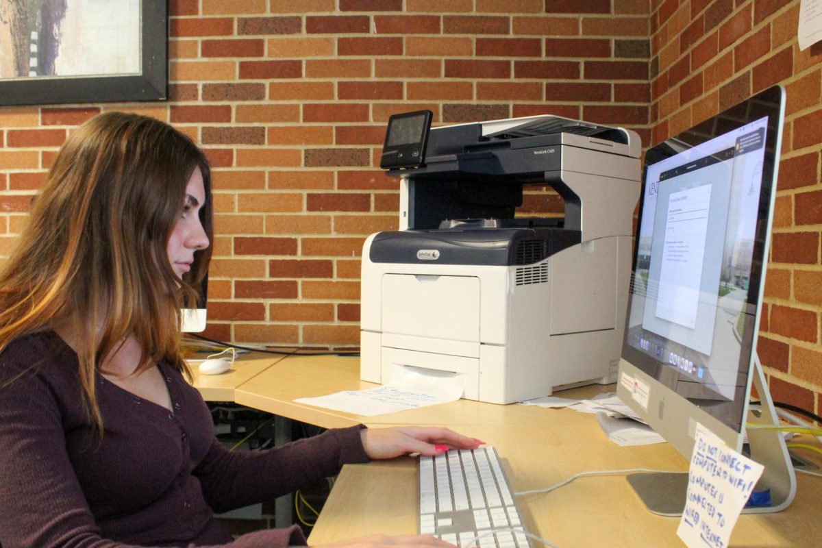 Kent State freshman Brenna Johnson works on an assignment in the CCI student lounge on Oct. 19, 2023. 