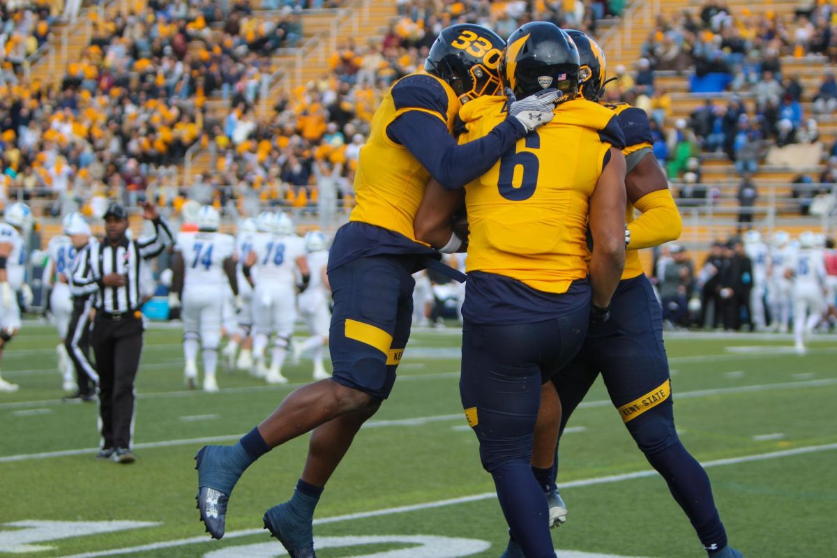 Kent State sophomore Stephen Daley celebrates with fellow teammates after a play during the game against Buffalo on Oct. 21, 2023.