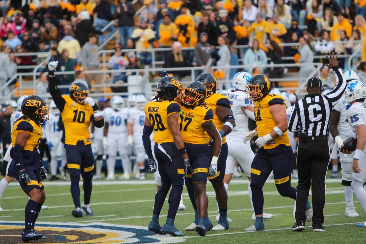 The Kent State football team celebrates during the 1st quarter of the homecoming game against Buffalo on Oct. 21, 2023.