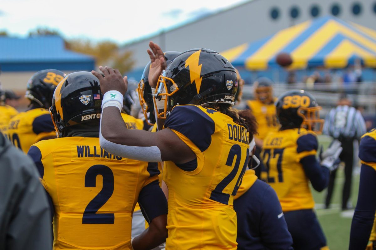 Kent State football players hype themselves up before the homecoming game on Oct. 21, 2023.