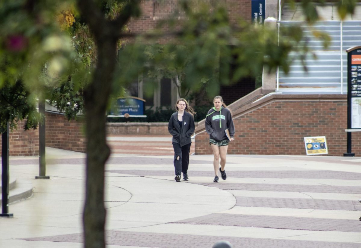 Students go for a walk on a campus left deserted due to Fall Break on October 7, 2023.