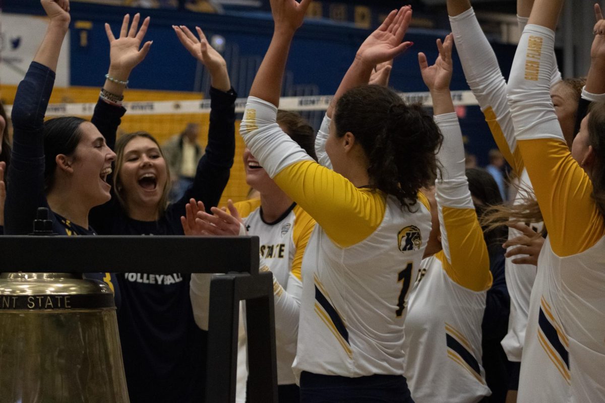 Kent State Flashes Volleyball celebrating their win against Miami University Redhawks on October 13, 2023.