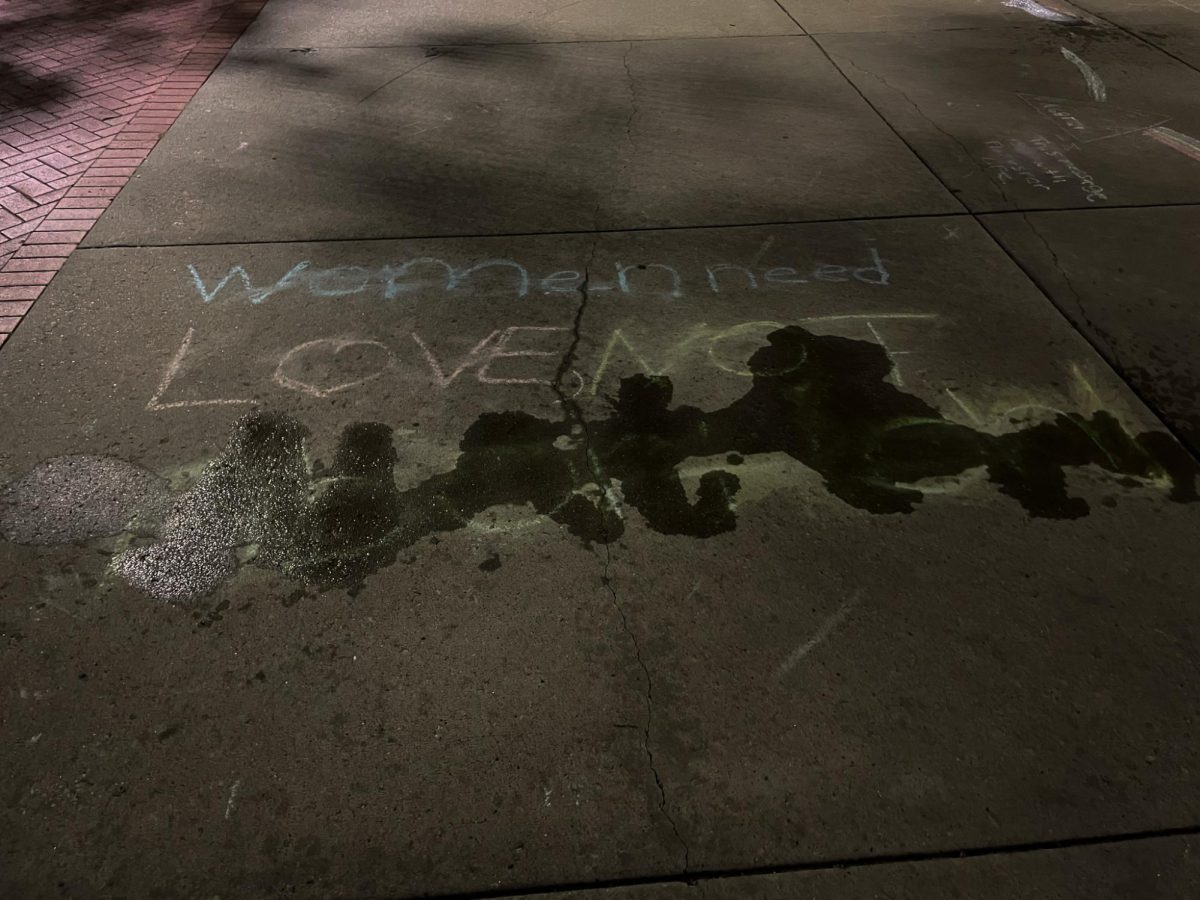 The words Not Abortion being erased with water on Kent State Campus on October 18, 2023 as Issue 1 voting comes near. 