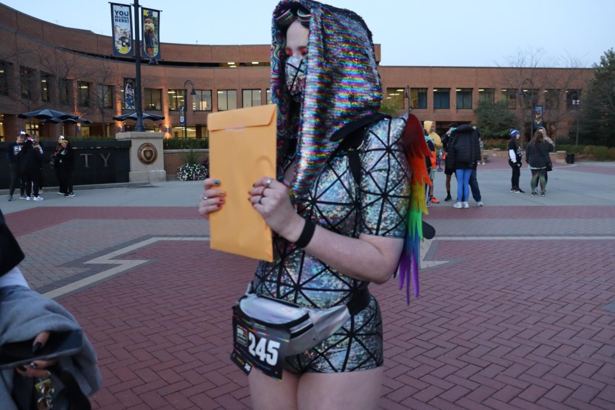 Alumnus Christy Salzwedel, winner of best rainbow attire.