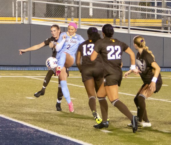 Kent State senior Callie Cunningham attempts a shot on goal as four Western Michigan defenders close in on Oct. 19, 2023.