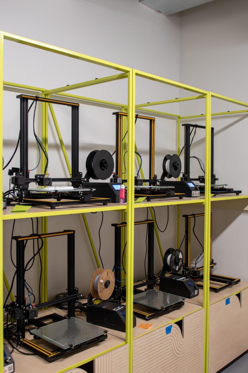 3D printers line the wall of the CAED FabLab on Nov. 8, 2023. 