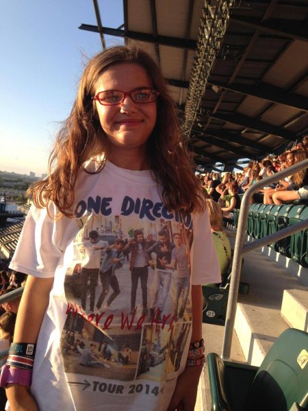 Young Annemarie Karabinus attending the One Direction Where We Are tour, Aug 2013