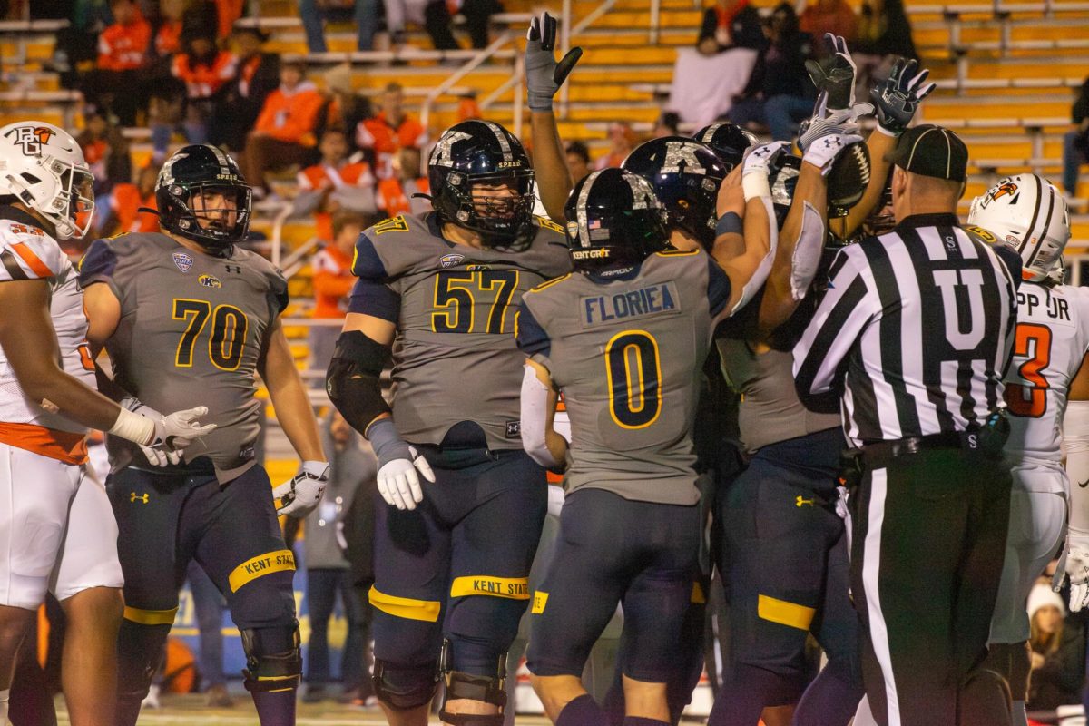 The Kent State football team celebrates a touchdown during the game against Bowling Green State University on Nov. 8, 2023.