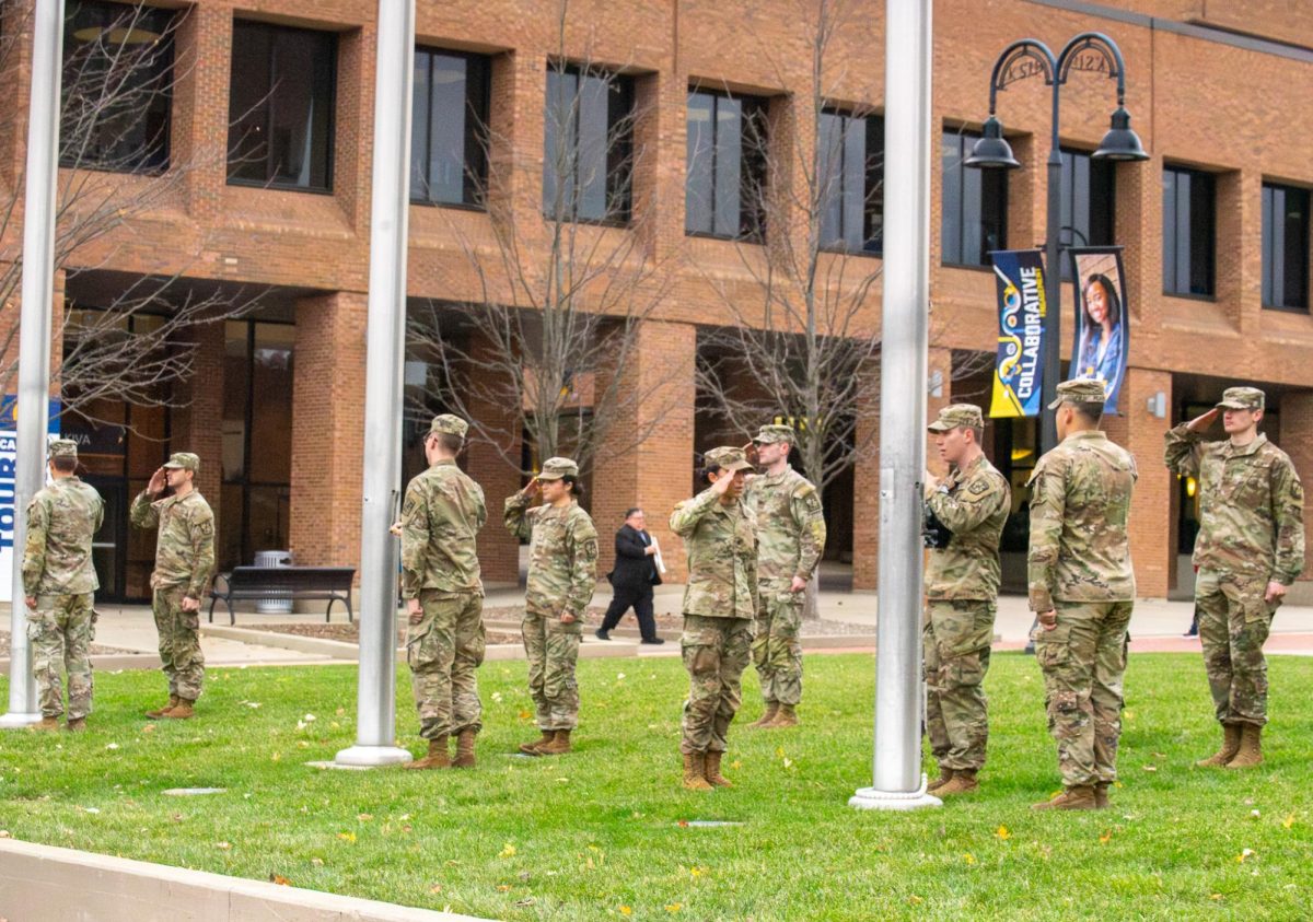 The Kent State ROTC gets ready to hang up the POW/MIA flag before the Veterans Day ceremony on Nov. 9, 2023. 