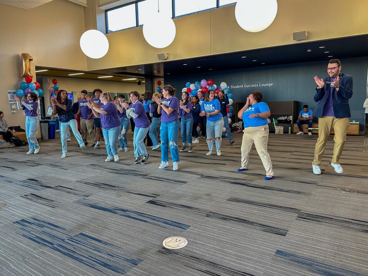 A group of students at the I Am First Celebration line dance in the CUE on Nov. 8, 2023. 