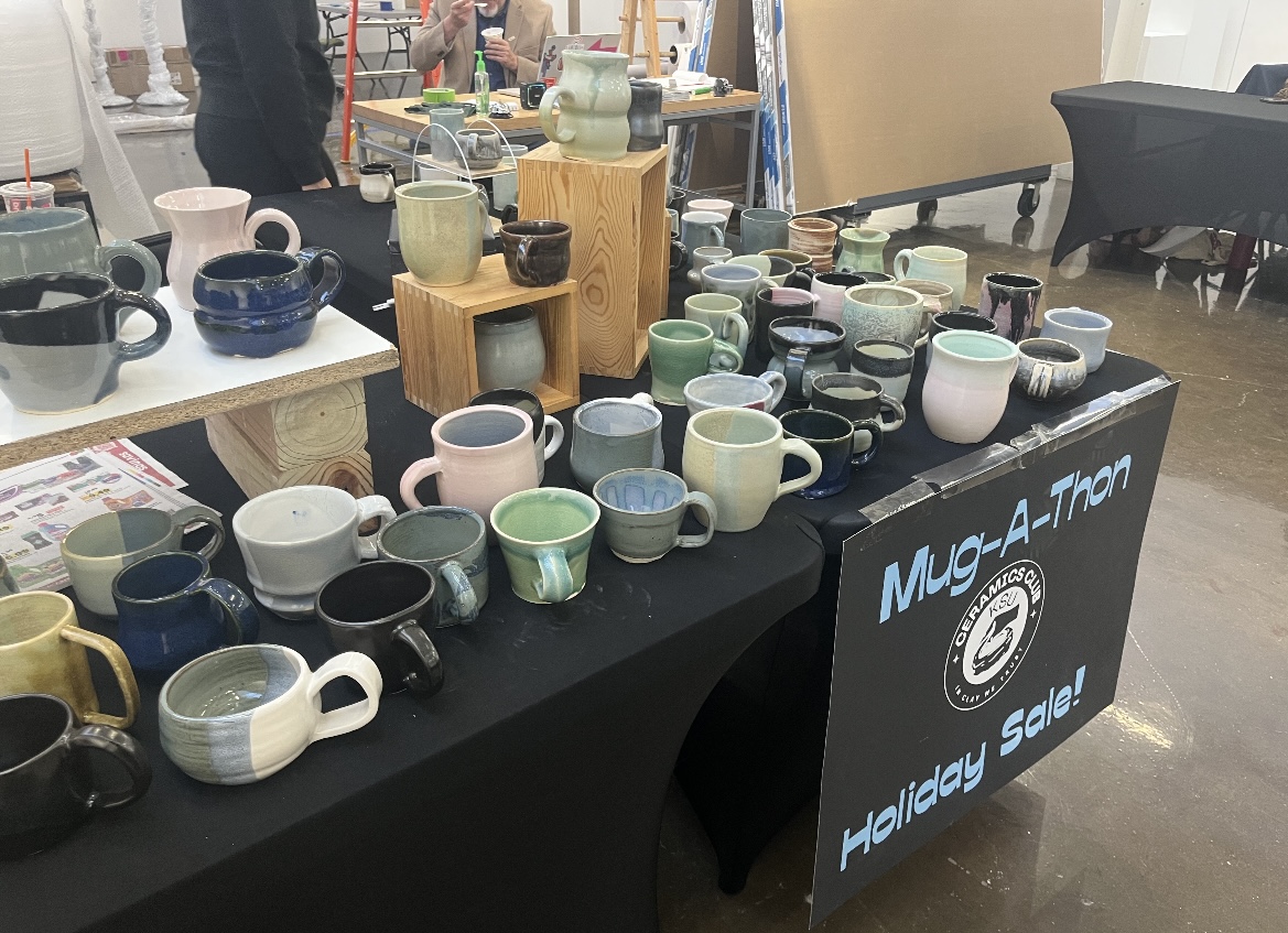 Ceramics Clubs mugs for sale at the School of Arts Annual Holiday Art Sale on Dec. 8, 2023. 
