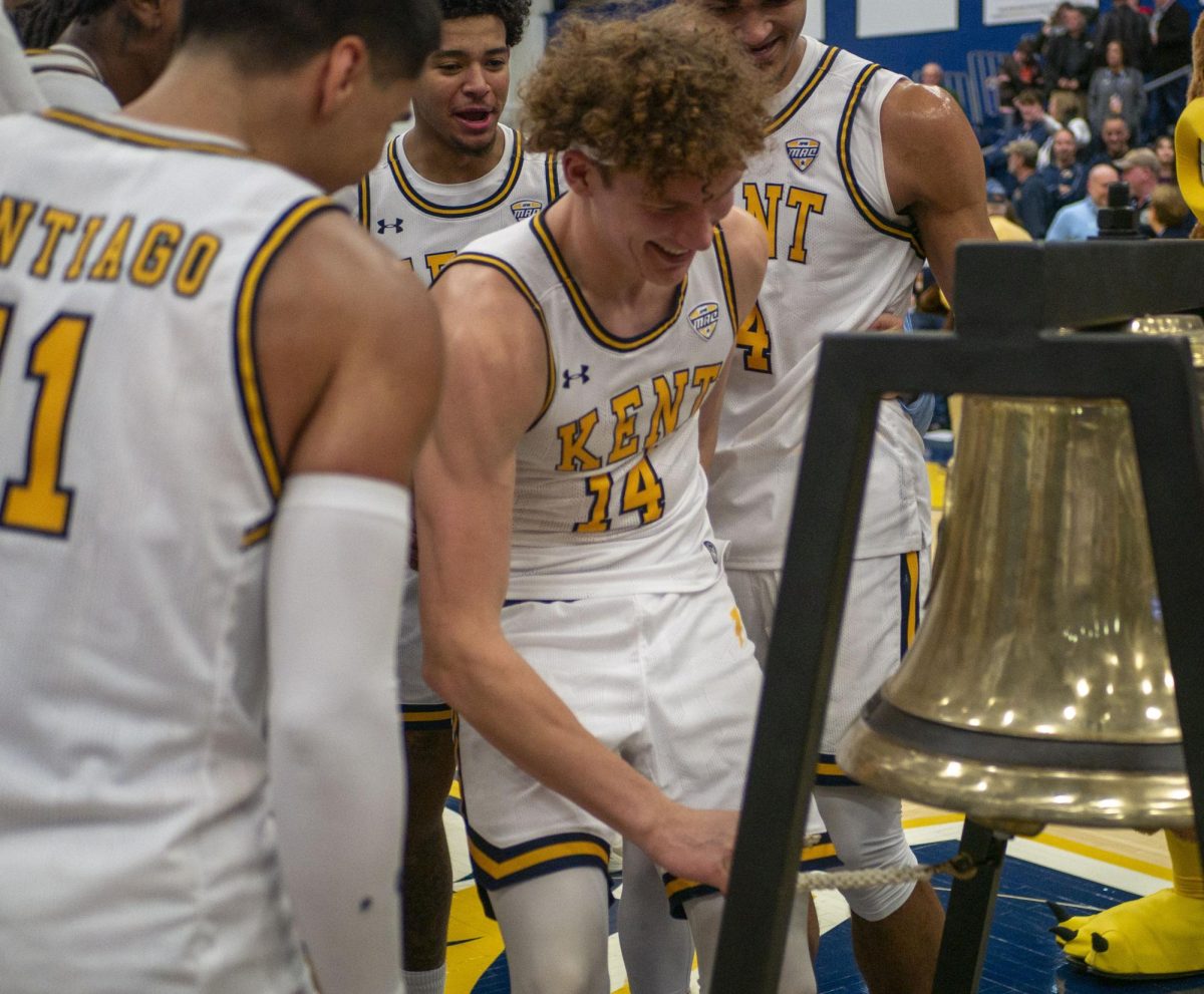 Sophomore forward Magnus Entenmann rings the Victory Bell following the Kent States 82-69 win over Ball State on Jan. 2, 2023. Entenmann, from Dresden, Germany, netted his career high in points and minutes against the Cardinals.  