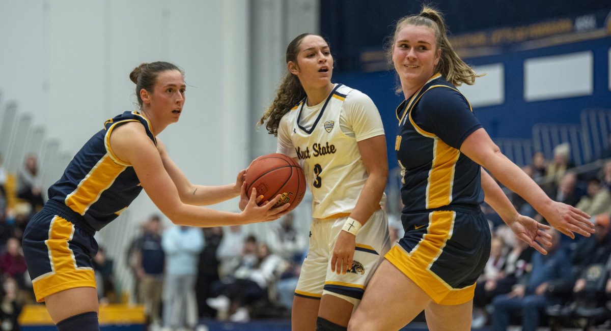 Toledo guard Sophia Wiard (left), Kent State sophomore guard Corynne Hauser and Toledo forward Jessica Cook react to the jump ball call during the Golden Flashes 87-76 loss on Jan. 17, 2024.  