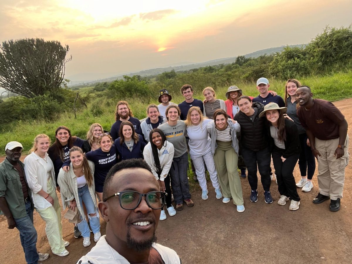 Kent State students and staff, finishing a safari in Akagera National Park.