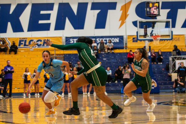 Sophomore Corynne Hauser on offense against two Eastern Michigan University players during the womens basketball game on Jan. 24, 2024.