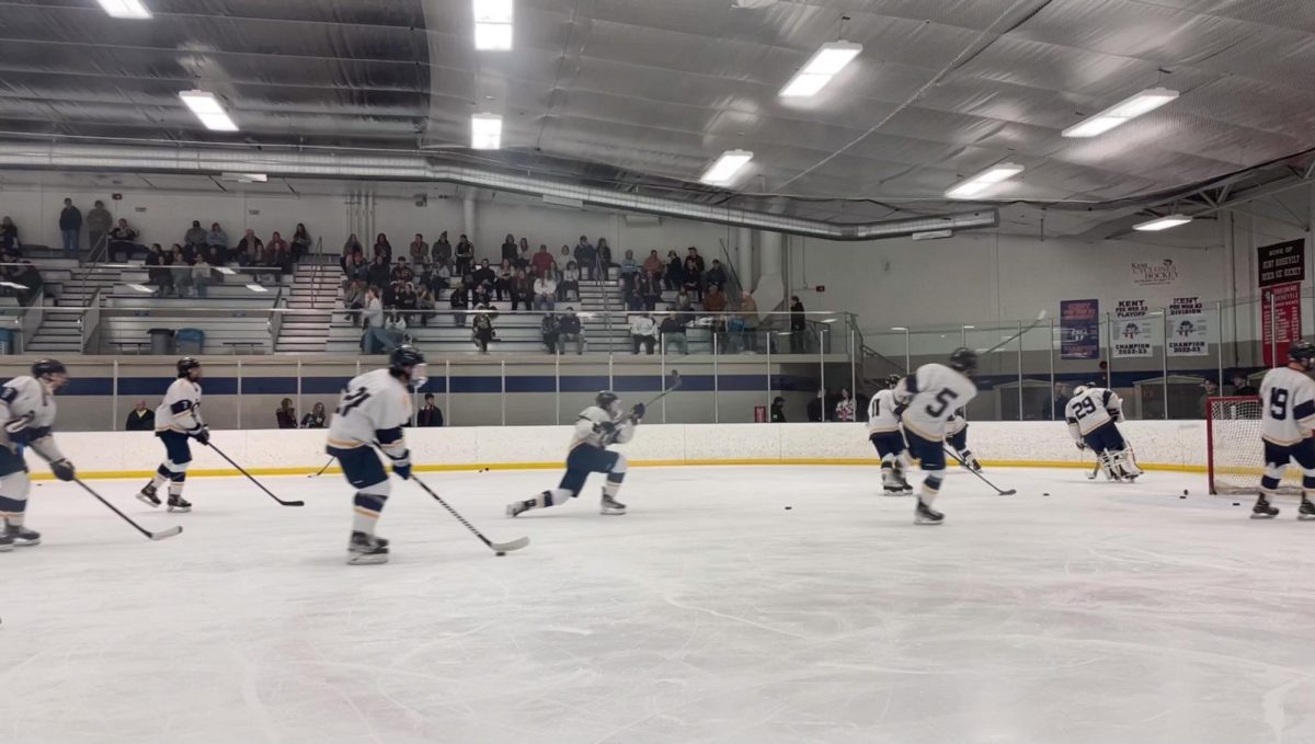 The Kent State hockey team races across the ice during their matchup against Robert Morris Jan. 29, 2024.