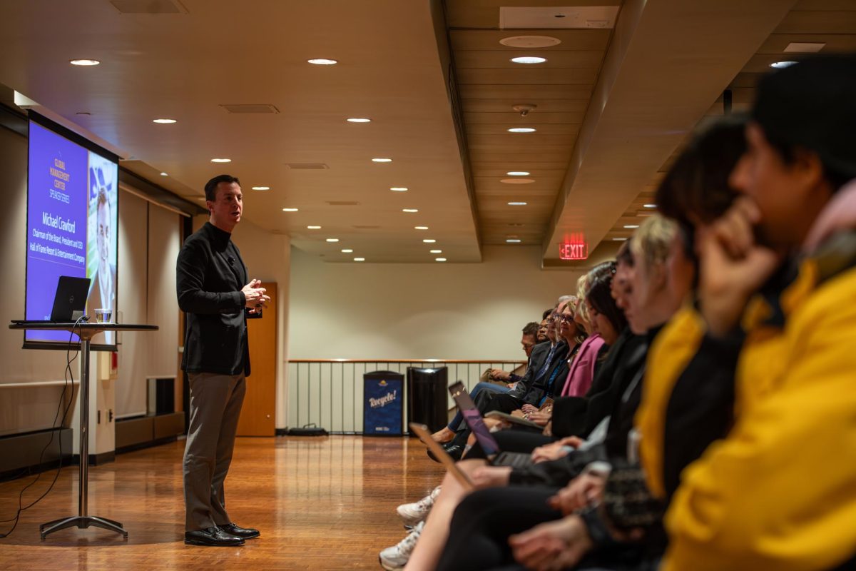 Michael Crawford, Chairman of the Board and CEO of the Hall of Fame Resort & Entertainment Company, delivers a speech to Kent students and staff on Feb. 7, 2024.